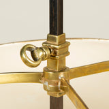 A large brass three-candle bouillotte lamps with tole shade. Mid-20th century French. Rewired.