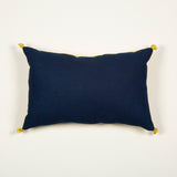 A cushion made up from 20th century indigo dyed linen backed with bourette finished with silk tassels.