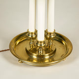 A large brass three-candle bouillotte lamps with tole shade. Mid-20th century French. Rewired.