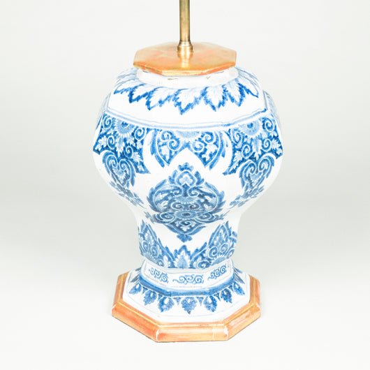 A blue and white facetted pottery vase in the Delft style, Paris circa 1760, wired as a lamp.