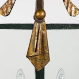 A mid-century French gilt iron lantern of tapered squared shape, the upper structure in the form of swags of fabric. Possibly by Poillerat, circa 1950.
