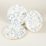 Plates decorated with a splattered blue pattern on a cream ground. £84 inc vat each.