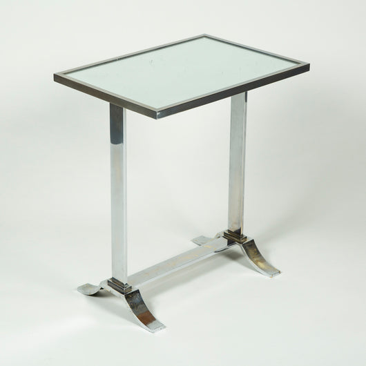 A low rectangular nickel-plated brass table with a mirrored top. 1930’s/1940’s, French.
