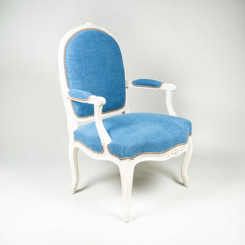 A white-painted Louis XV fauteuil of generous proportions, circa 1770.
