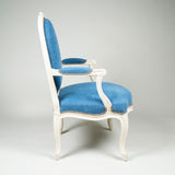 A white-painted Louis XV fauteuil of generous proportions, circa 1770.