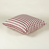 A pair of 21” square cushions made up in a lilac silk check fabric.