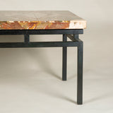 A Sicilian jasper veneered table top mounted on a metal base as a coffee table.