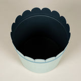 A tole cachepot with scallop rim. Available in a plain dragged paint finish with picked-out details -Pale blue.