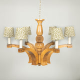 A mid 20th century French Walnut chandelier with six splayed tapering arms and a central bobbin stem, rewired.