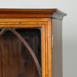 An early Regency mahogany secretaire bookcase with ebonised stringing and bone drawer knobs, circa 1800.