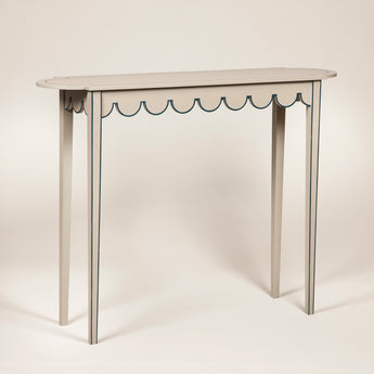 A tall D-end table with scalloped frieze and line detailing. Made to order. Bespoke size and finish available upon request.