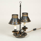 A late 19th century painted tole two candle student’s lamp, now wired for electricity.