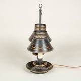 A late 19th century painted tole two candle student’s lamp, now wired for electricity.