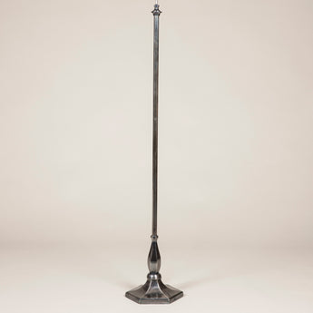 A floor lamp copied from a 1940's original with an hexagonal stem and base. Antiqued Brass or Silvered versions made to order.