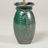 A green glazed Belgian studio pottery vase with applied cord decoration, wired as a lamp
