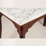An 18th century French oak console table with unusual stepped pied de biche legs and original marble top.