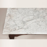 An 18th century French oak console table with unusual stepped pied de biche legs and original marble top.