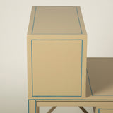 A pair of painted two tier bedside tables with an upper shelf, a small drawer and lattice details.