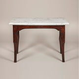 An 18th century French oak console table with unusual stepped pied de biche legs and original marble top.