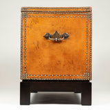 A tan leather-covered coffer with decorative brass nailing and marquetry lined lid. 18th century with a later stand.