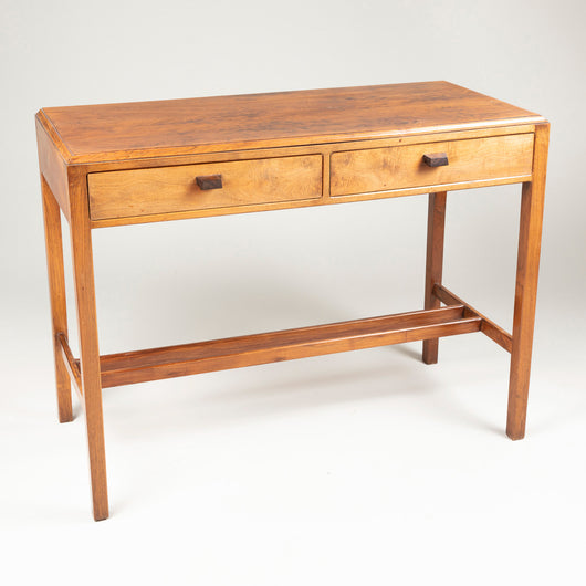 A walnut side table by Peter Waals, mid 20th century.