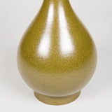 A pair of olive green glazed pottery vases, converted to lamps.
