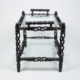 Two similar turned and carved ebony rectangular two-tier low tables. Madagascar, probable 20th century.